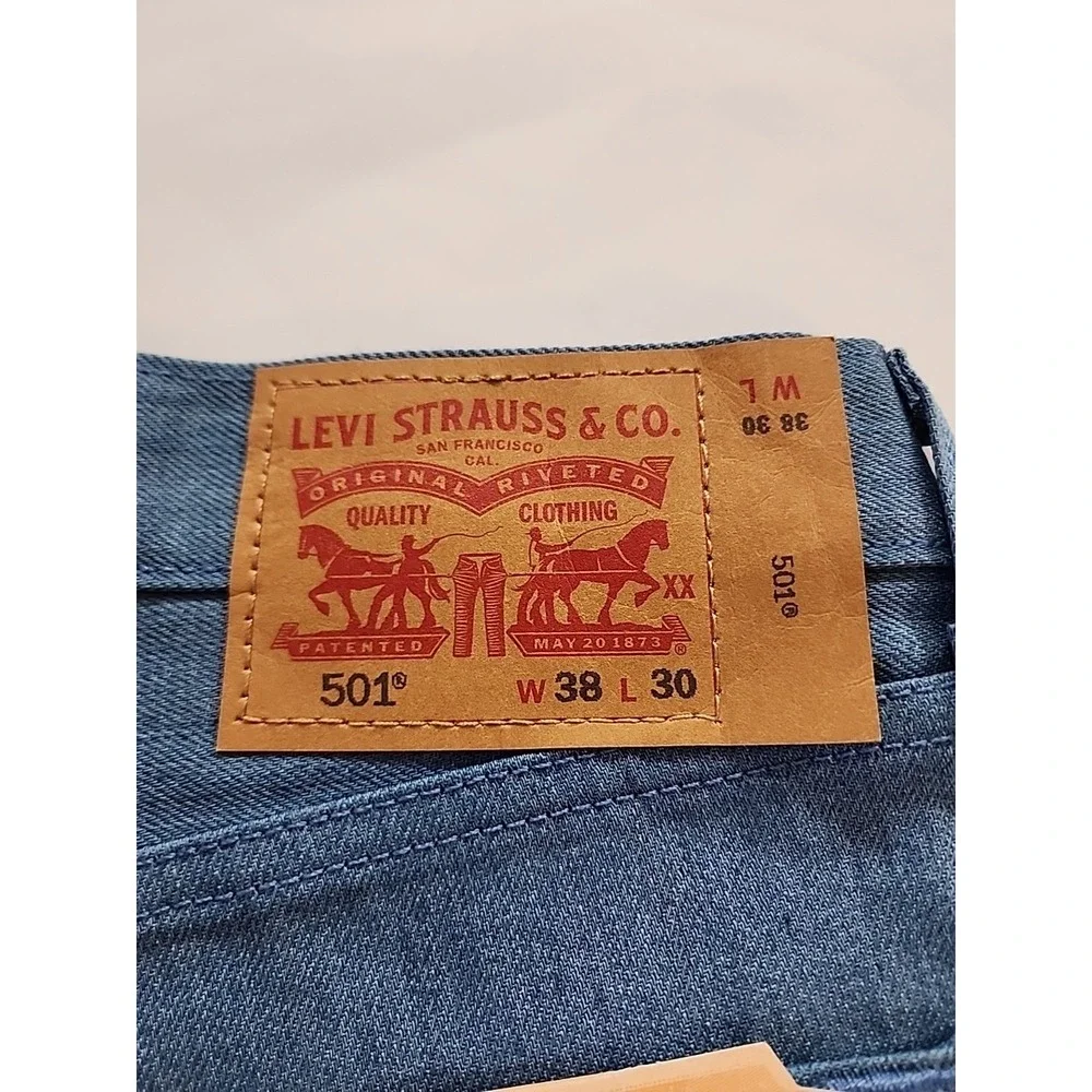 Levi's 501 men's 38X30 Buttonfly Light blue jeans Shrink To Fit Straight Leg NWT